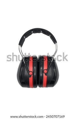 Side view of black hearing protection helmets with red line. Hearing protection for the shooting range, firearms, work, machinery and all types of loud sounds Royalty-Free Stock Photo #2450707169