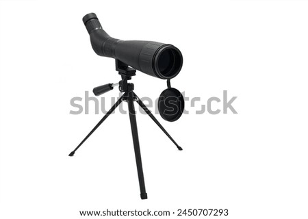 Front view of small, lightweight spotting scope mounted on tripod. Used to view the dianba at the shooting range Royalty-Free Stock Photo #2450707293