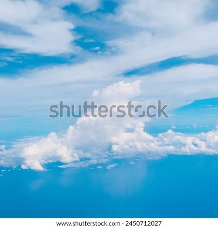 a picture of clouds taken from above in an airplane