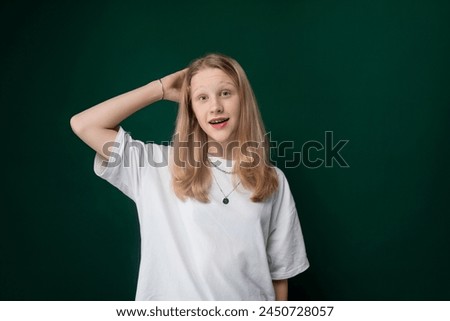 Girl in White Shirt Posing for Picture