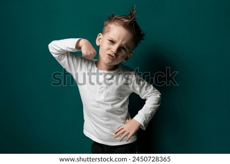 Young Boy Poses for Picture