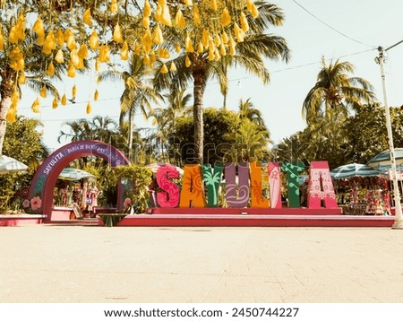 Colorful word letter sign of Sayulita in Mexico placed in the center of town for all to be welcomed.
