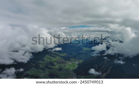 Aerial view of village in valley and mountain in Austrian Alps, Austria