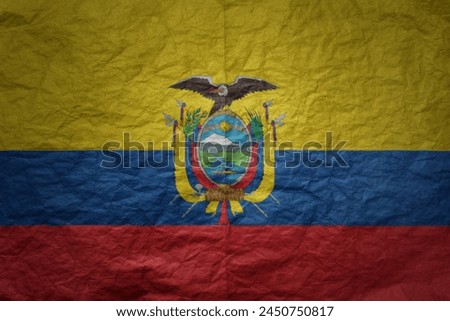 colorful big national flag of ecuador on a grunge old paper texture background