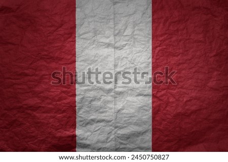 colorful big national flag of peru on a grunge old paper texture background