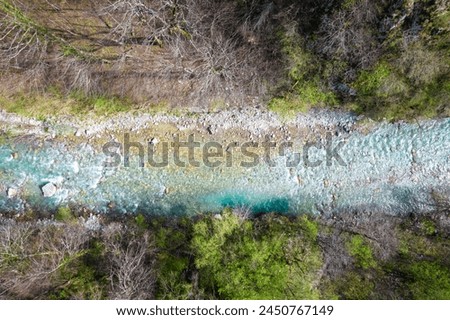 Aerial view over the surface of a mountain river Sutjeska.