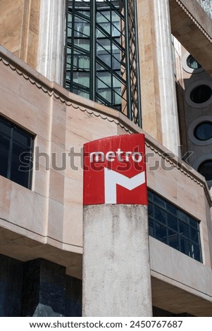 The symbol indicating a metro stop in a square