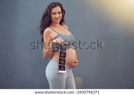 Studio, pregnancy and woman in portrait with ultrasound picture of baby, infant or results of child. Pregnant person, scan and happiness with mockup space, news and excited on gray background