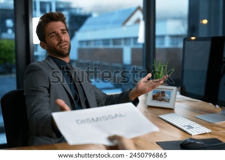 Businessman, upset and stress with letter of dismissal in office for compliance, performance and review. Male employee, anger and unhappy with termination notice for failure of company policy Royalty-Free Stock Photo #2450796865