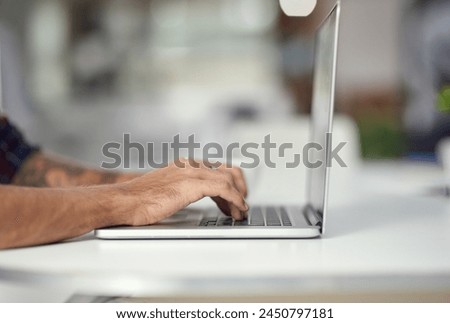 Closeup, laptop and employee on desk in office for business, company and organization in workspace. Man, copywriter and technology for typing on deadline for editor in magazine, agency or publication