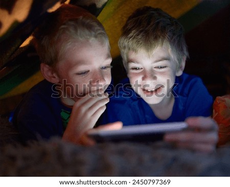 Smile, children and brothers on tablet in tent at home for game, movie or streaming cartoon online at night together. Happy kids, siblings and technology for app, internet or family relax in house