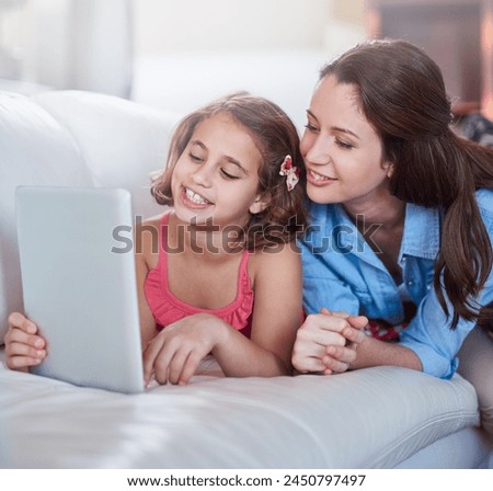 Mother, girl and kid on sofa with tablet for streaming, elearning or online games with bonding or together at family home. Happy, love and woman on break with daughter, connection and ebook with tech
