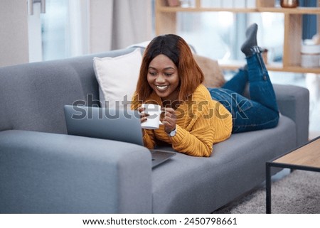 Relax, coffee or happy black woman with laptop on sofa for streaming movie, show or film at home. Pc, search and African girl with tea in a living room for online sign up, video or social media reel