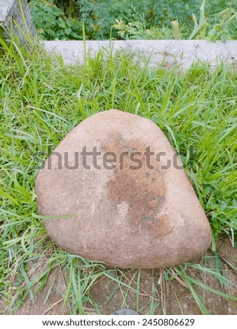 This natural stone found in the mountains or rural areas is very cool on the side of the road, so it's very good for anything Royalty-Free Stock Photo #2450806629