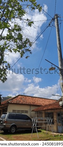 Central Java, Indonesia - April 15 2024, morning atmosphere of the village in Pekalongan, Central Java with clear and cool skies Royalty-Free Stock Photo #2450818959