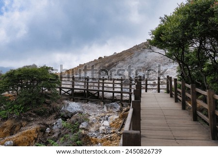 A wooden bridge built in the Sikidang Crater tourist area in Java, Indonesia