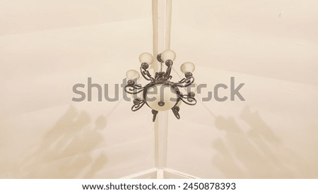 Isolated picture of bottom view of a modern vintage chandelier or lampu kuno 