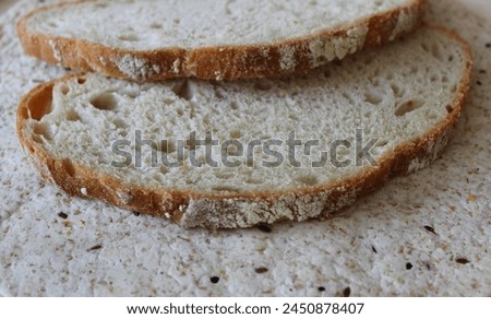 Closeup stock photo of homemade bread slices on the surface of yeast free lavash with grains
