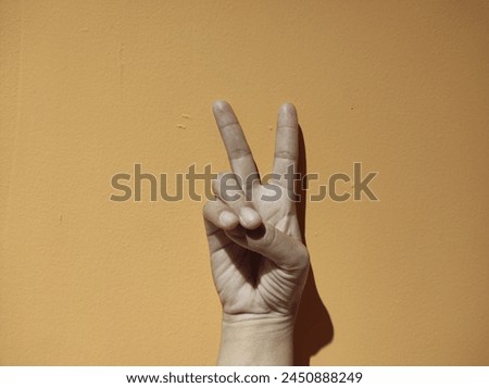 two fingers as a symbol of peace
