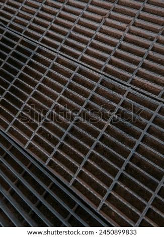 Floor treads that look strong and resistant to rust, their symmetrical shape add to their aesthetic value.
 Royalty-Free Stock Photo #2450899833