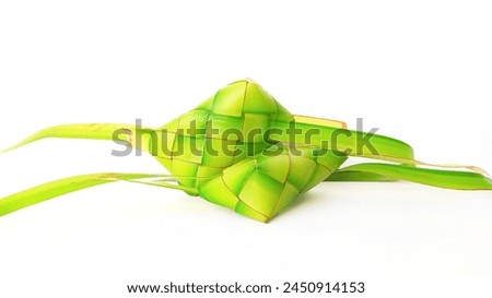 Ketupat pillow or Diamond rice Eid specialty food isolated on a white background, in indonesia called (Ketupat Bantal) because of the various forms available