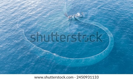 Aerial view to Yacht in deep blue sea. Drone photography. Amasing aerial view to Yacht in deep blue sea with swimming girl. Drone photography