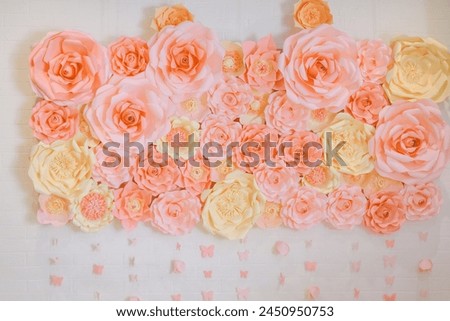 The background of rose flowers is made of handmade paper.