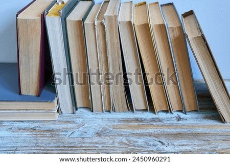 Books on wooden table. Education background. Back to school. Copy space.