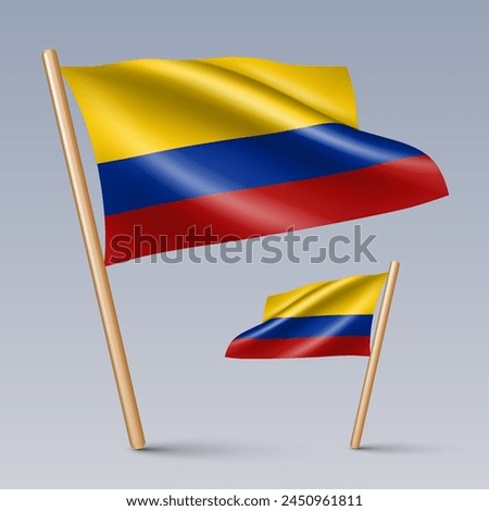 Vector illustration of two 3D-style flag icons of Colombia isolated on light background. Created using gradient meshes, EPS 10 vector design elements from world collection