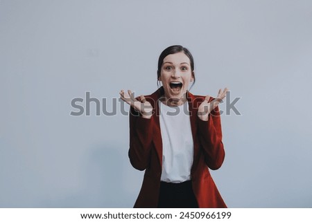 Happy young businesswoman on white background