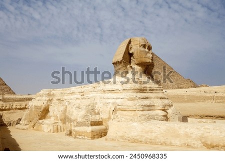 The Great Sphinx and the Great Pyramids in Giza, Egypt. They were built during the Fourth Dynasty of the Old Kingdom Royalty-Free Stock Photo #2450968335