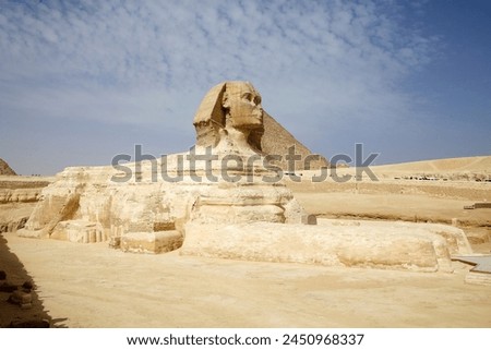 The Great Sphinx and the Great Pyramids in Giza, Egypt. They were built during the Fourth Dynasty of the Old Kingdom Royalty-Free Stock Photo #2450968337