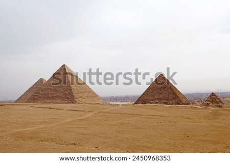 The Giza Pyramid Complex in Giza, Egypt, also called the Giza Necropolis. It was built during the Fourth Dynasty of the Old Kingdom Royalty-Free Stock Photo #2450968353