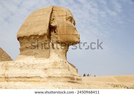 The Great Sphinx in Giza pyramid complex, Egypt. It was built during the Fourth Dynasty of the Old Kingdom Royalty-Free Stock Photo #2450968411