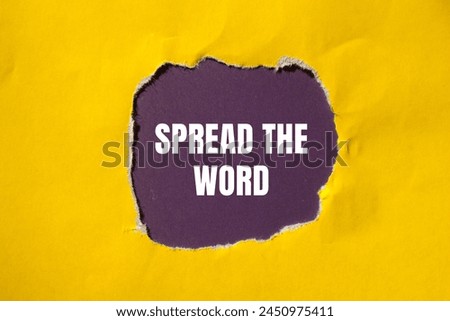 Spread the word written on ripped yellow paper with purple background. Conceptual spread the word symbol. Copy space.