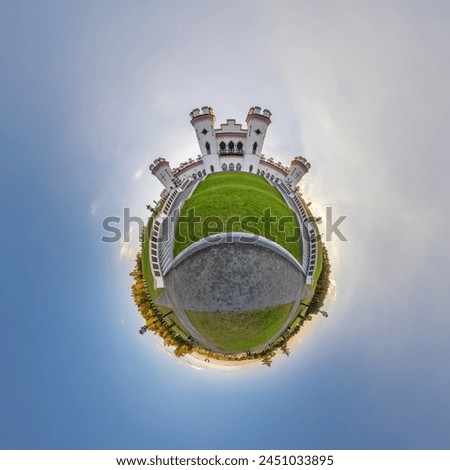 little planet and spherical aerial 360 panorama view on street ancient medieval castle with church and historic buildings with columns Royalty-Free Stock Photo #2451033895