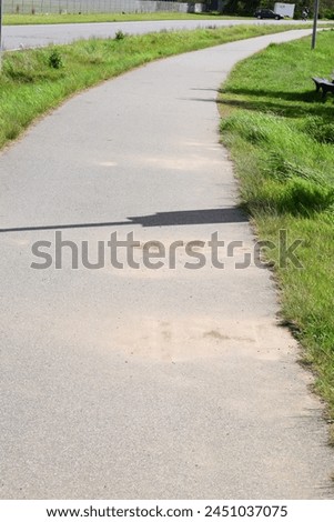 narrow old bike road with dirt