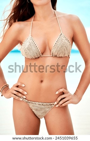 Woman, body and bikini at beach with confidence on holiday, summer vacation and relax on tropical island. Person, swimsuit or tourist at seaside for sun tan, clean air and fun in nature on weekend