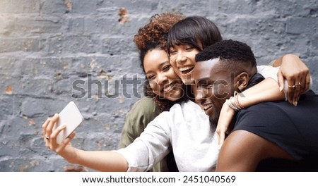 Selfie, social media and smile with friends on brick wall background for profile picture update. App, energy or excitement with happy man and woman group in city for mobile or online photography