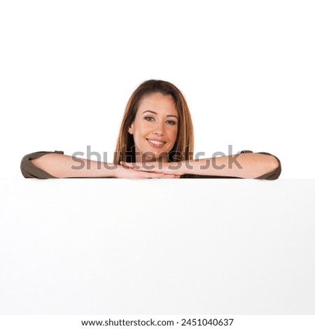Mockup, portrait and woman with poster in studio for advertising, marketing or promotion. Smile, banner and confident female person with blank space sign, placard or board by white background.