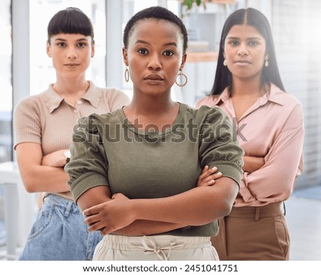 Portrait, serious and creative women in office building of designer company, diversity and confident. People or group of management for agency with arms crossed for collaboration and empowerment. Royalty-Free Stock Photo #2451041751