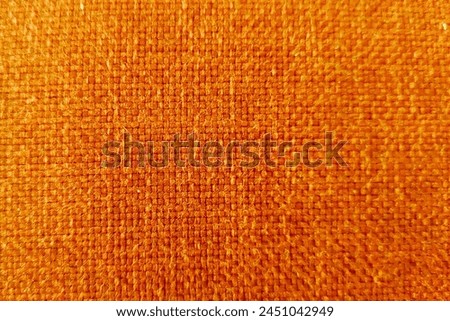 Orange yellow fabric rough texture, orange textile, close-up shot, good for illustration background and design