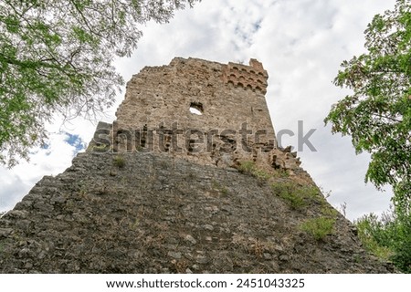 Feodosia, Crimea. Tower of St. Constantine. The tower was part of the defensive structures that protected the Genoese fortress of Kafa Royalty-Free Stock Photo #2451043325