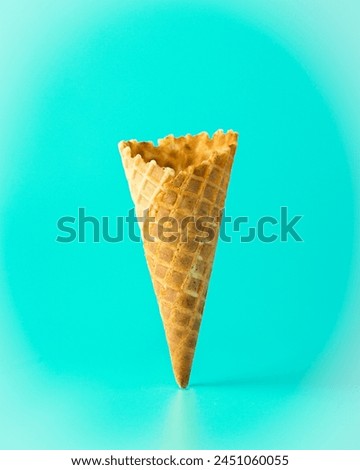 Ice cream cone isolated on frozen background