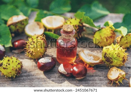 Horse chestnut extract in a bottle. selective focus. nature. Royalty-Free Stock Photo #2451067671