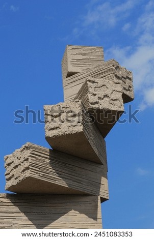concrete blocks prepared for construction against blue sky