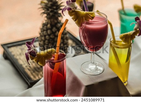 Free Cocktail drinks with slices of pineapple stock photo, Mocktail top on the table 