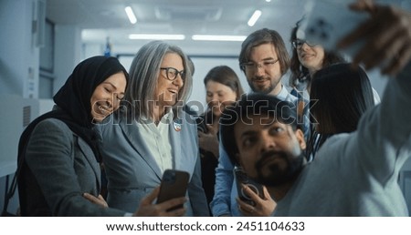 Happy diverse people take pictures with female presidential candidate after voting. Multiethnic US citizens with politician at polling station. National Election Day in the United States. Slow motion.