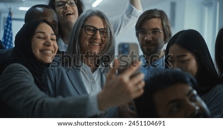 Multiethnic people come to female presidential candidate after voting. US citizens talk and take selfies with American politician at polling station. National Election Day in United States of America.