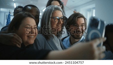 Multiethnic people come to female presidential candidate after voting. US citizens talk and take selfies with American politician at polling station. National Election Day in United States of America.